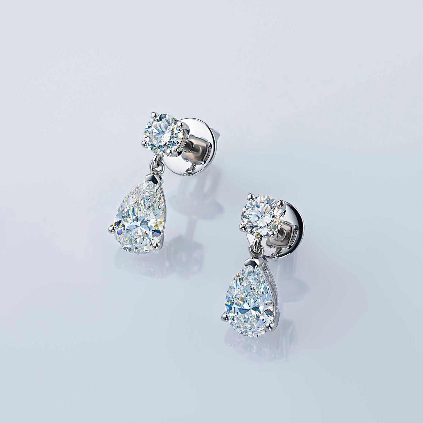 Sterling Silver Earring Studs with Emerald and Topaz 2.930 CT.TW